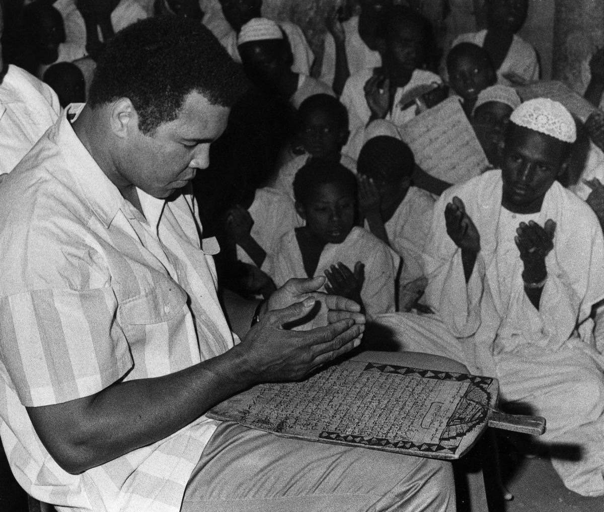 Muhammad Ali prays in a Mosque in Khartoum, Sudan, 1988
