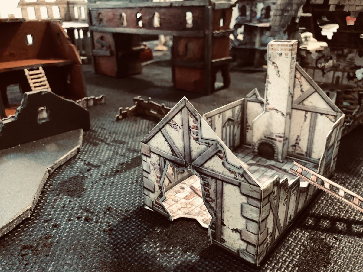 Some photos of my Mordheim table that I've been working on for about a month!