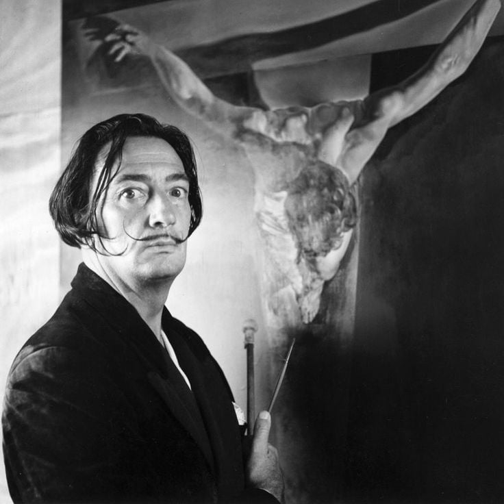 Good Friday? Well, I've had better... Salvador Dali, in 1951, painting one of the jewels in the Glasgow collection's crown, Christ of St John of the Cross. Pics: Daniel Farson