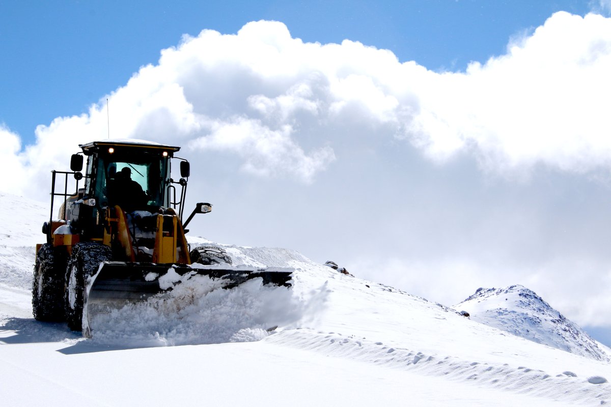 Plowing snow at 12,000 ft. Want to know if we're open to the summit today? Call 719-385-7325