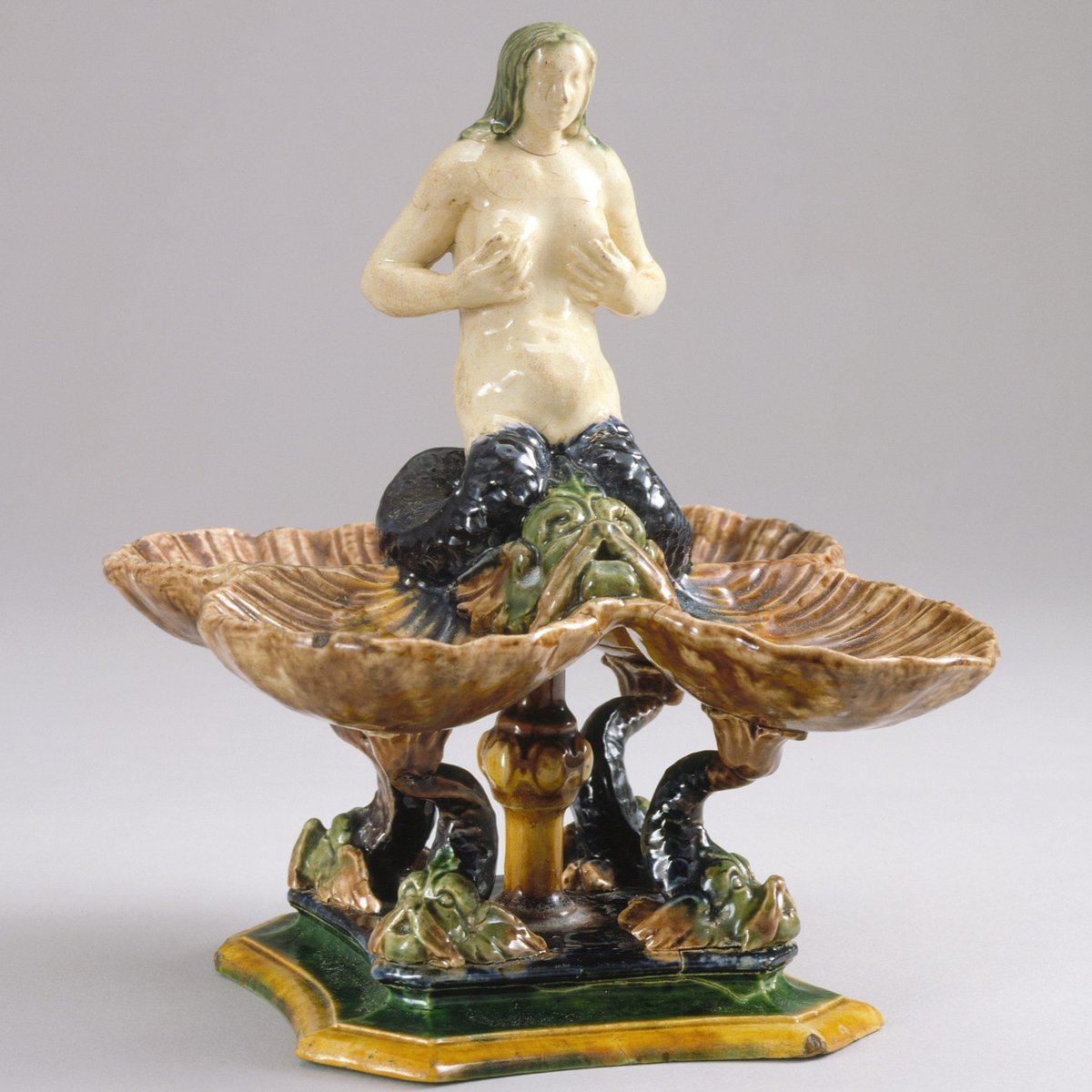 i'll be the blue mermaid you be the pink 🧜‍♀️ happy #InternationalMermaidDay to all who celebrate!!! [Palissy (after), Bernard, Salt-Cellar with a Mermaid, Shells and Dolphins, circa 1560-1600, Lead-glazed earthenware]