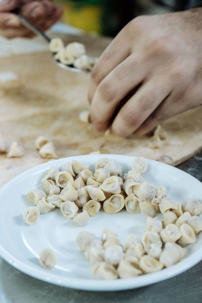 Azerbaijan's tweet image. One of the best dumplings in world, Azerbaijani #dushbara is filled with lamb or beef, and usually served in broth.

They’re folded by hand, a process made more difficult by their small size. Vinegar &amp;amp; garlic sauce tops it off with an extra kick.

Source: amp.cnn.com/cnn/travel/art…