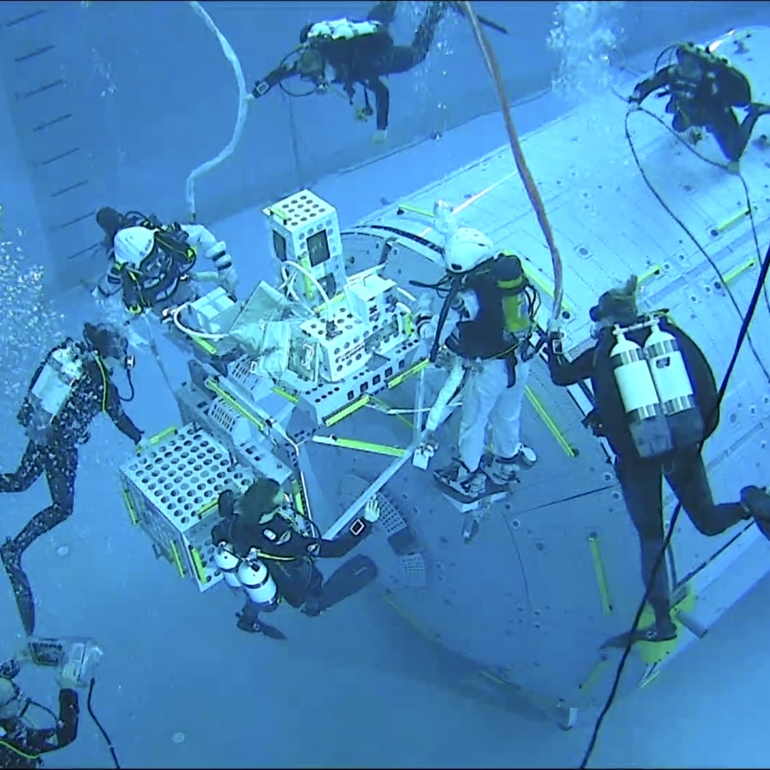 Soph_astro's tweet photo. _-_Diary of an #ESA #astronaut candidate_-_
[Basic training - week 45]

👩‍🚀🤿 ‘EVA RUN 3’ in the NBF, pool at #EAC Cologne 🇩🇪
We are being pushed at the edge of our comfort zone in order to make faster progress.
I was teamed with @Raph_Astro, my Belgian #AsCan colleague & friend. We worked on the procedures together and simulated maintenance procedures as well as an incapacitated crew rescue. Simulating an emergency, I rescued Raphaël and brought him back safely to the airlock. And vice versa, of course, so that each of us could have a go at this rescue procedure. Super interesting exercise: combining dexterity and problem solving. We both survived!
🤩 Mission accomplished!

I also had the invaluable chance to dive with @astro_luca 🇮🇹: progress is huge when being mentored by an experienced astronaut. Thank you 🙏 Luca for all the tips and tricks you gave me!

🙏 Big thanks to @ESAstro_trainer & @COMEX_officiel teams who challenge us to make us progress.

📷 Credits: @esa