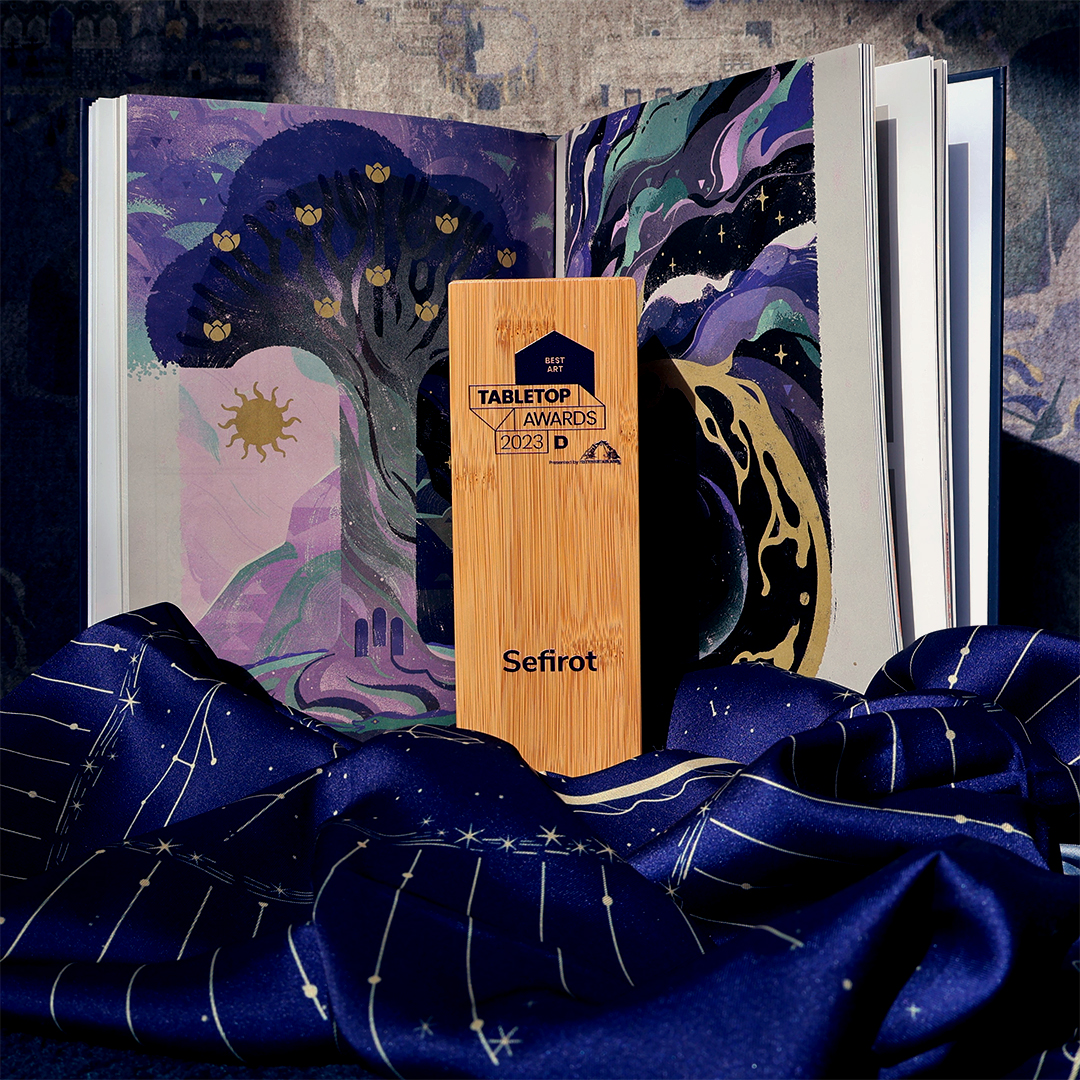 The Sefirot Games (@thesefirotgame) on Twitter photo Our Award finally arrived! Sefirot won the Best Art category at the 2023 Tabletop Awards! We are speechless and thankful to receive this honour.
A round of applause for our outstanding artists <a href="/_elibaum/">Eliot 🌳 on 🦋☁️!</a> and <a href="/viv_tanner/">Viv 🌲 on 🦋</a> Our Award finally arrived! Sefirot won the Best Art category at the 2023 Tabletop Awards! We are speechless and thankful to receive this honour.
A round of applause for our outstanding artists <a href="/_elibaum/">Eliot 🌳 on 🦋☁️!</a> and <a href="/viv_tanner/">Viv 🌲 on 🦋</a>