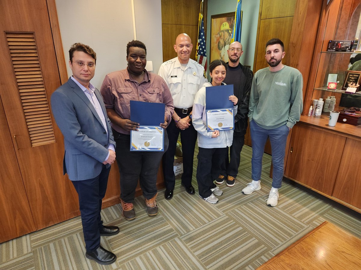 Congrats to Emanuel Douglas &amp; Zoey Bennett on completing internships with the PFD's Office of Innovation and Technology! They're pictured here with members of our OIT team and Fire Commissioner Craig Murphy. We wish them both the best on their future plans. #PFDstrongertogether