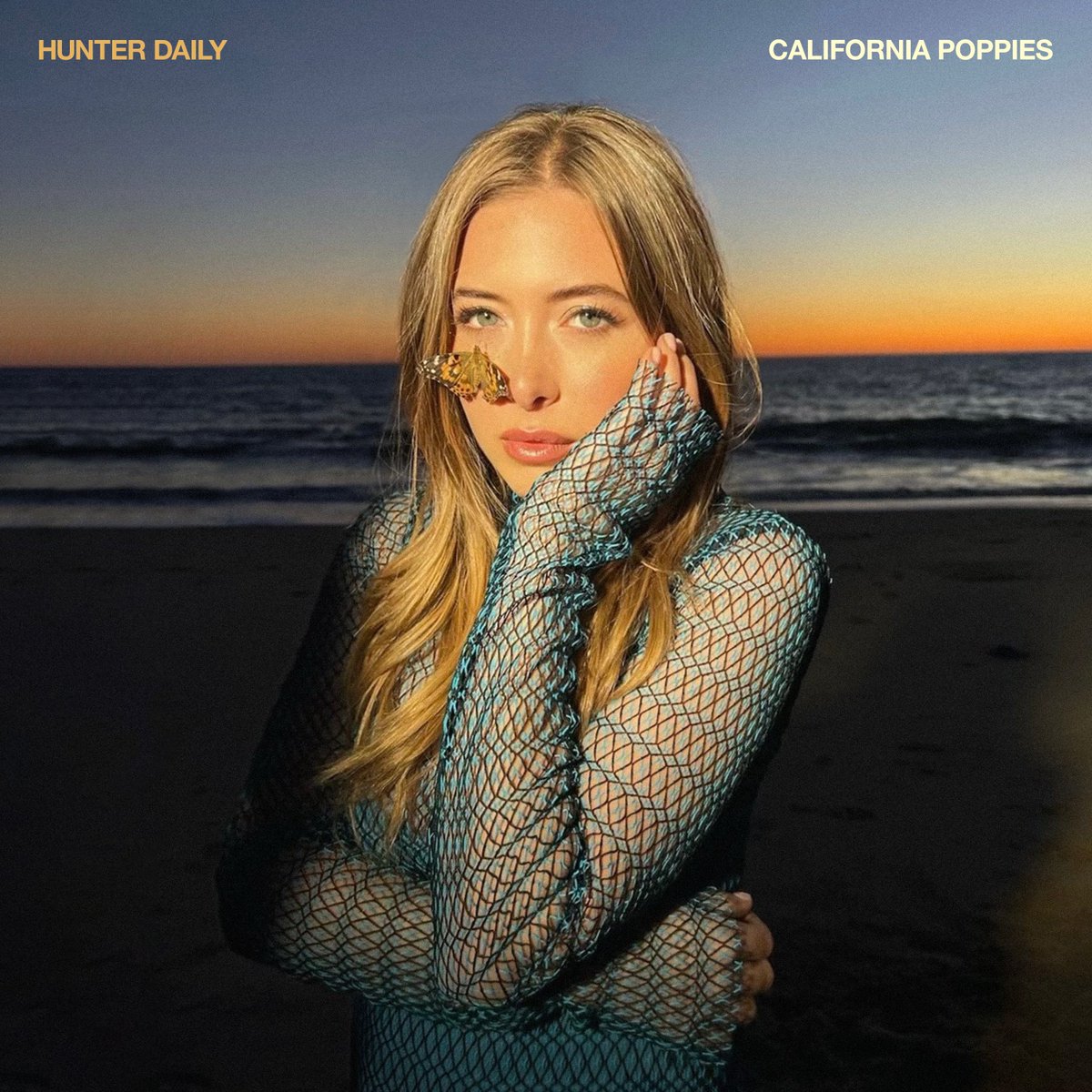 CALIFORNIA POPPIES don’t die they just turn into butterflies 🦋🦋🦋✨✨😝✌️ i love this song so much!!! go listen!!!! and yes that is a real butterfly on my face!!! orcd.co/hunterdailycal…