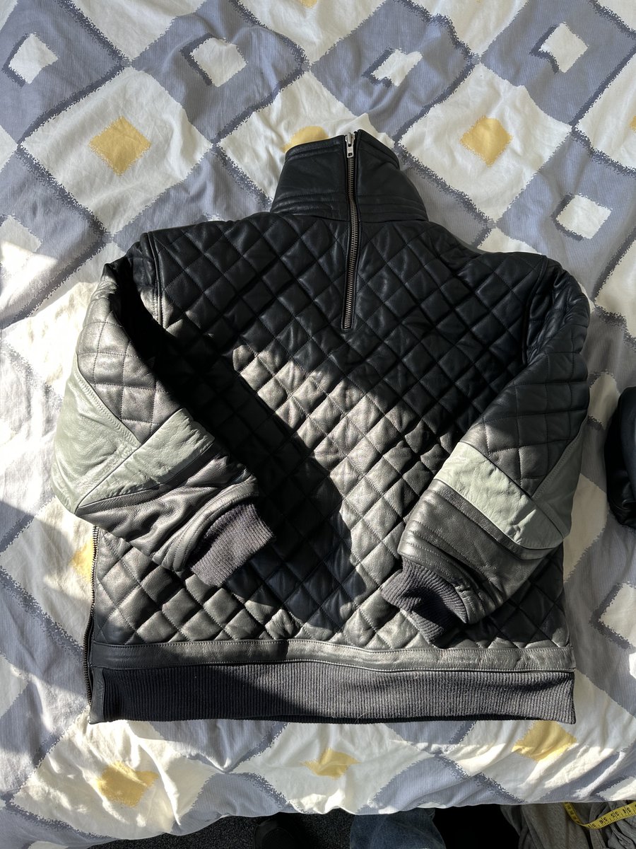 Selling: leather top - grey and black quilted leather. cow 1mm leather with leather lining - quite bulky. Very hot ! 69cm side to side Back neck zip Side access zip 15cm tall collar Cow 1nm leather lined Shoulder to wrist 56cm Beck to base 68cm Offers over £20 (plus postage)