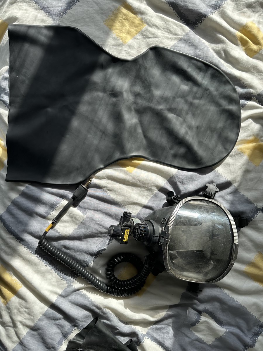 Selling; Unknow origin rubber hood with Anaesthetic cover over nose with tube Back zip Size unknown. Medium to large. Plus rubber hood and gas mask. Offers over £10 (plus buyer pays postage)