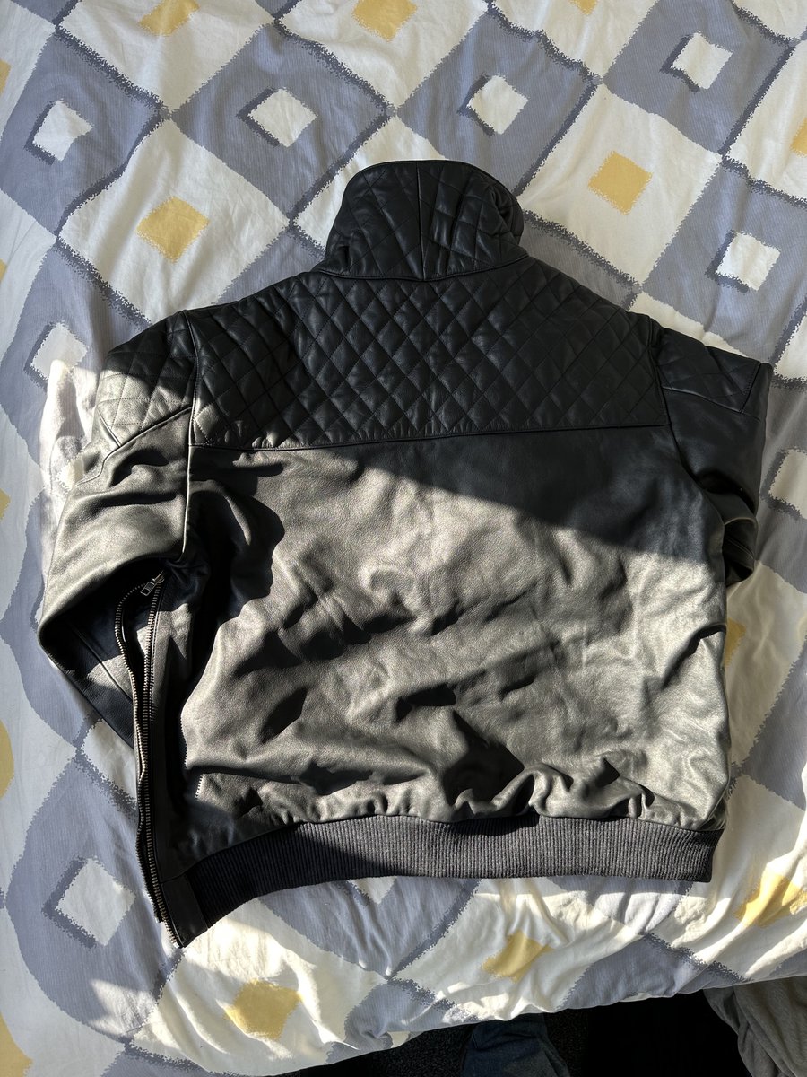 Selling: Black leather top - Hem not Ieather Front pockets side access zip Cow 1mm leather lined 14cm high collar 70cm side to side 59cm neck to base. Quite bulky and hot! Offers over £30 plus postage to be paid by buyer
