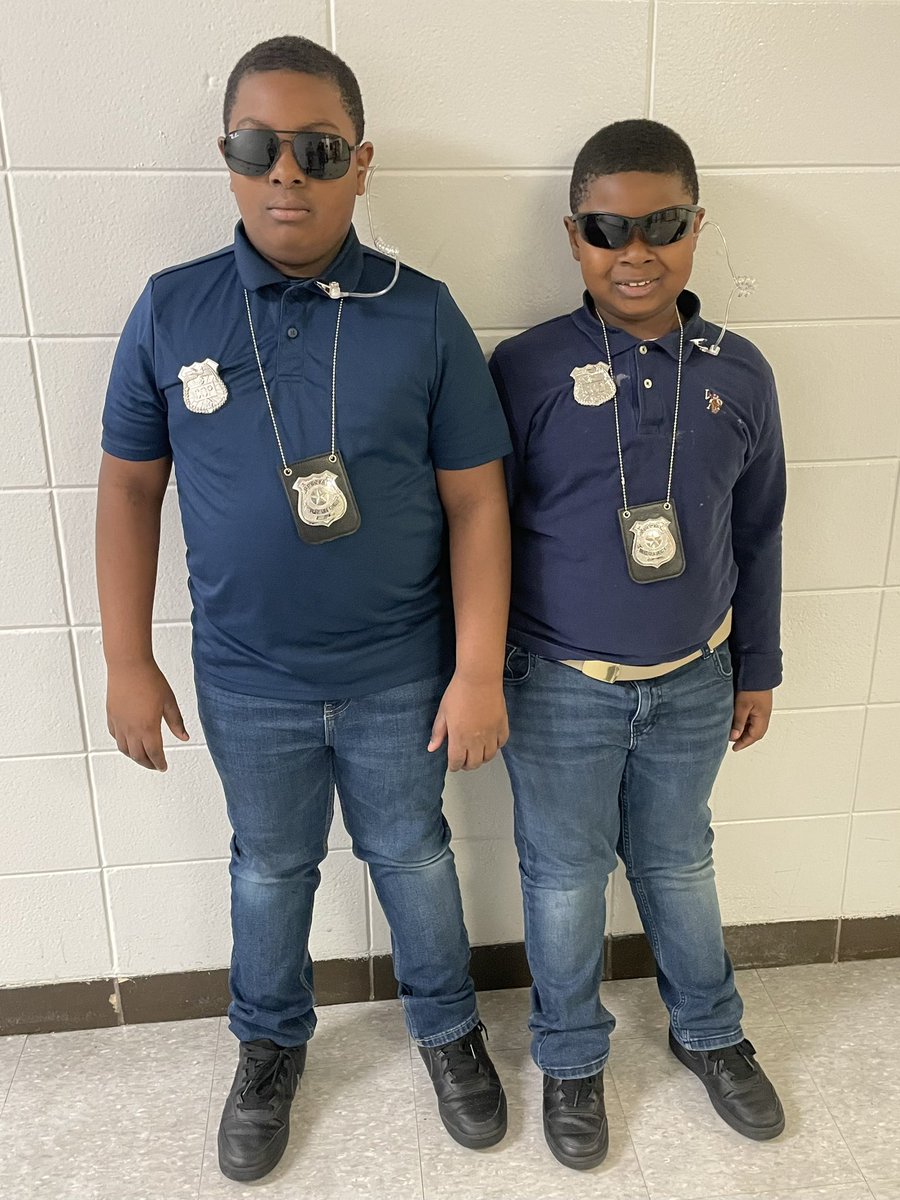 Gutermuth was much safer with Officer Charles and Officer Charles reporting for duty today! 😉😂 #careerweek #futurecareerday @GutermuthES @alexiswagner98