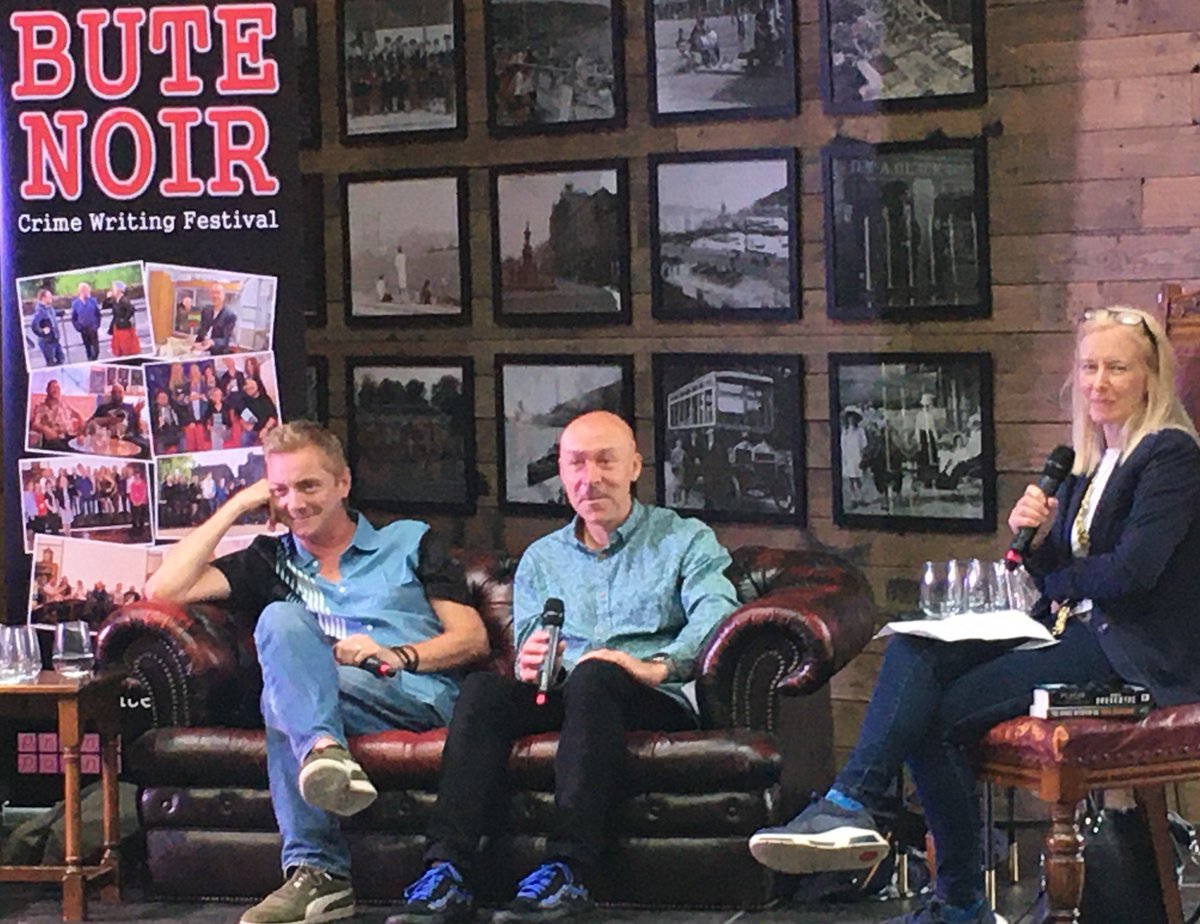 Sorting through some photos from last year's Bute Noir courtesy of @craigsisterson and loving the sheer mischief in this pic of @doug_johnstone and @cbrookmyre.