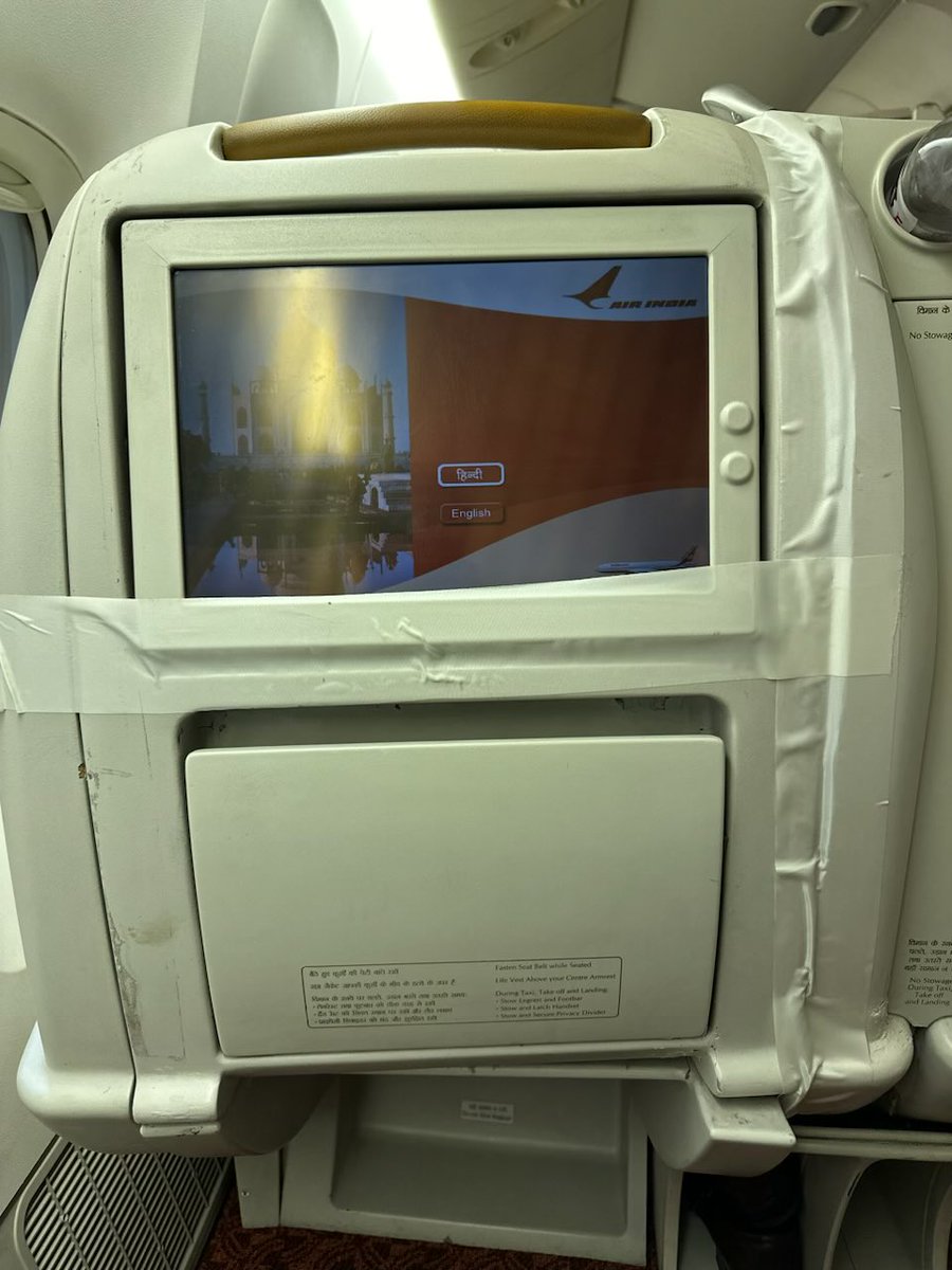 Sansu74's tweet photo. ⁦@airindia⁩ business class- traveling in the lap of luxury. Yes, that’s duct tape!! What a joke! https://t.co/M5aslOclfR