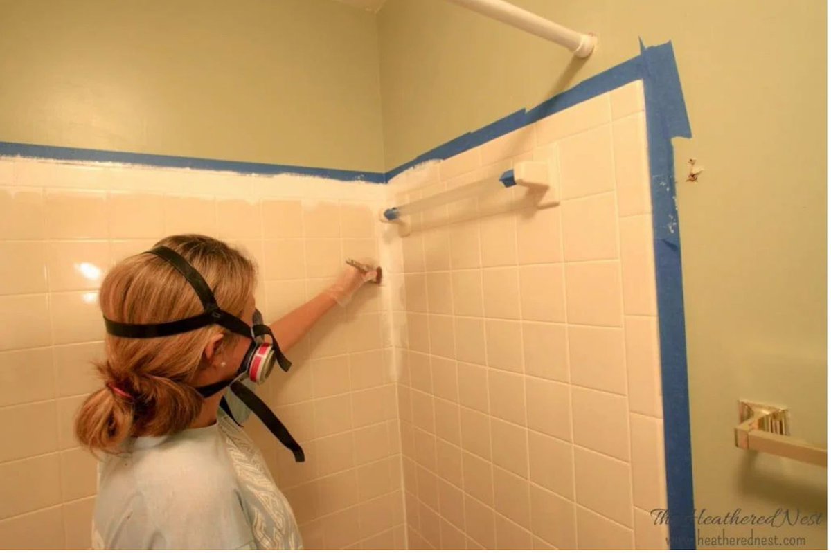 😳 YIKES! We painted our bathroom tile. See how it turned out here and decide whether it's a project you'd like to try in your own home 👉 bit.ly/3uvAxH0