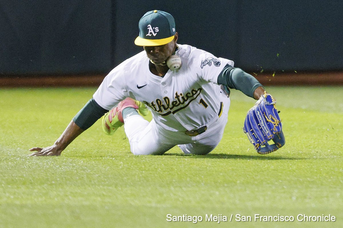 Oakland Athletics left fielder Esteury Ruiz is O.K. after the baseball gets away from him on a diving catch attempt. @sfchronicle @SportingGreenSF