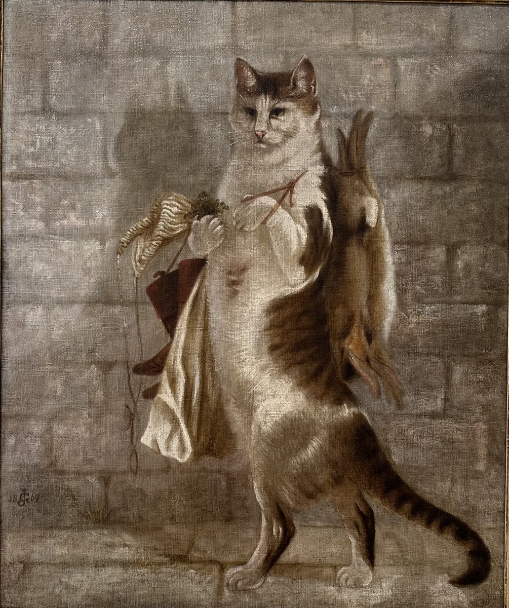 'Portrait of Thomas, a favourite cat in the character of Puss in Boots - Puss carrying a Present of Rabbits to the King', by Gertrude Jekyll (1843-1932), 1869. Godalming Museum Collection B999.60 (my photo).