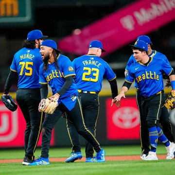 Players high-five after tonight's win. 