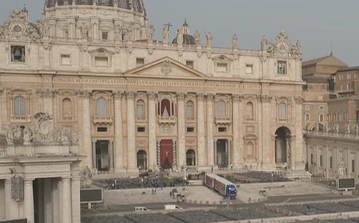 Volunteers are unloading one of three trucks from the Netherlands carrying thousands of flowers (bulbs that will be planted in the gardens later) for Easter Mass tomorrow in St. Peter's Square.