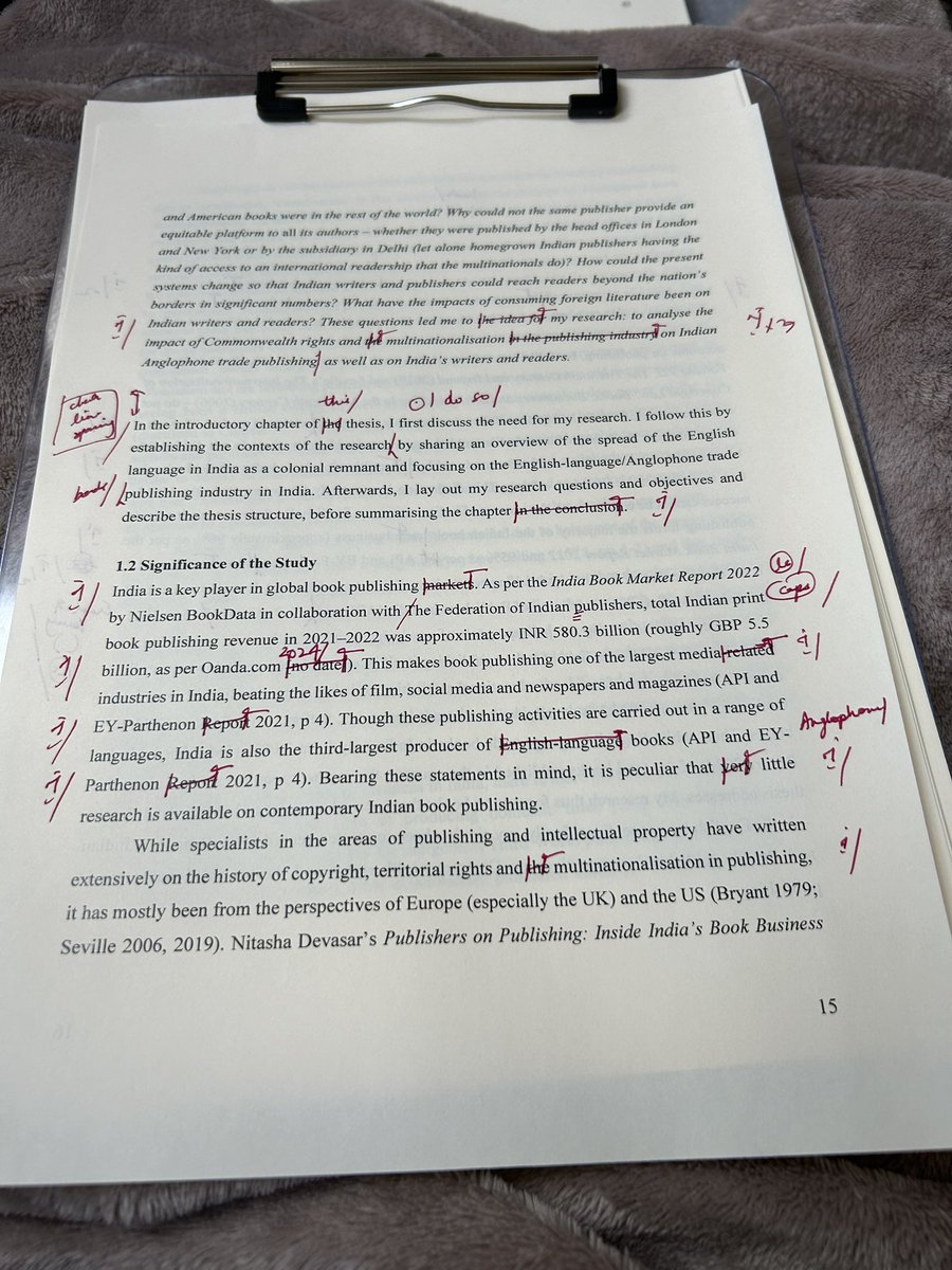 Dad was surprised I was red-marking my own writing Aiming to submit the thesis this week (!!!) after this copyediting round #phd #phdlife