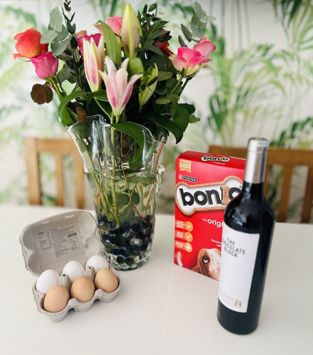 I ❤️village life - 3 hrs ago @Ralph_Retriever & I set off to help decorate the church for Easter, drop off a card and pick up a torch. Just arrived home with a bunch of flowers, bottle of wine, 6 freshly laid eggs & a box of @Purina bonios. There are no shops in our village 🤣