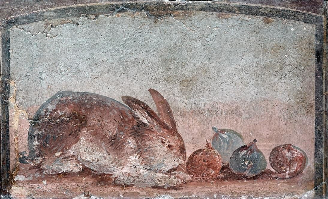 Cute Pompeii Easter bunny eating figs.