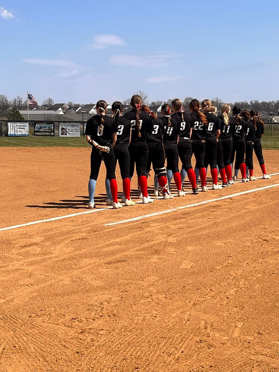 Today, the Lady Indians softball team honors Carson Hughes by wearing blue and red socks