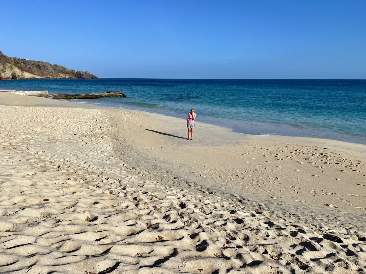 Walking along the 2 mile beach of Grand Anse Grenada