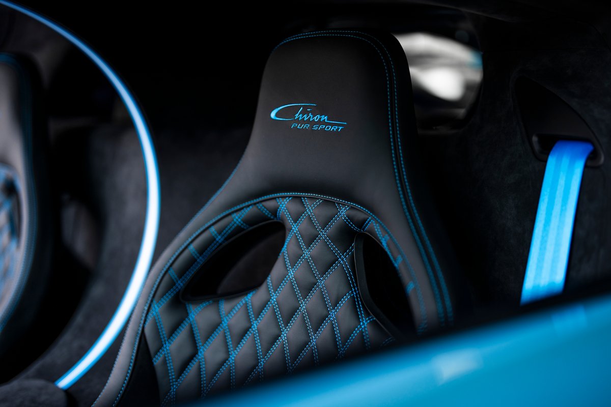 Embracing the legacy of Jean-Pierre Wimille, this CHIRON Pur Sport’s interior pays tribute to a BUGATTI racing icon. From personalized center console script bearing Wimille's initials to contrast stitching inspired by the color of his iconic Type 57G Tank, every detail is