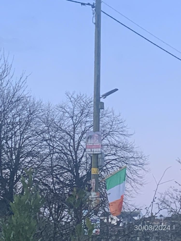 Despite repeatedly asking local #sinnfein reps in Crossmaglen not to put the tricolour on poles with Pauls posters,they have once again rubbed salt into our wounds. There are plenty of other poles they can adorn with flags. Why do have to do this against our express wish?