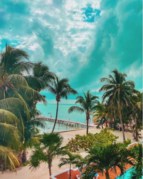 Welcome to Caye Caulker, where tranquil waters meet vibrant sunsets, and the only thing on your to-do list is to relax and unwind.🌅🏝️ Comment 'Go Slow' if you love Caye Caulker! 😎🍹⛵#TravelBelize 📷: @iccy.madds