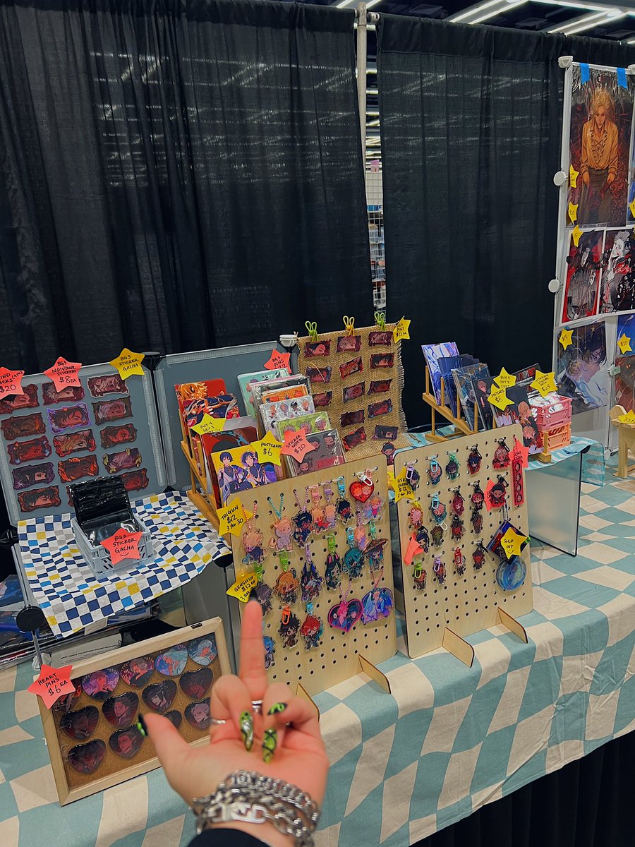 viol_vrt's tweet photo. hi this is my table @ sakuracon this weekend say hi if you’re here 🥴also look at my beautiful caz photocard that @IMINZEMI made for meeeee https://t.co/TMFaI6tgtk