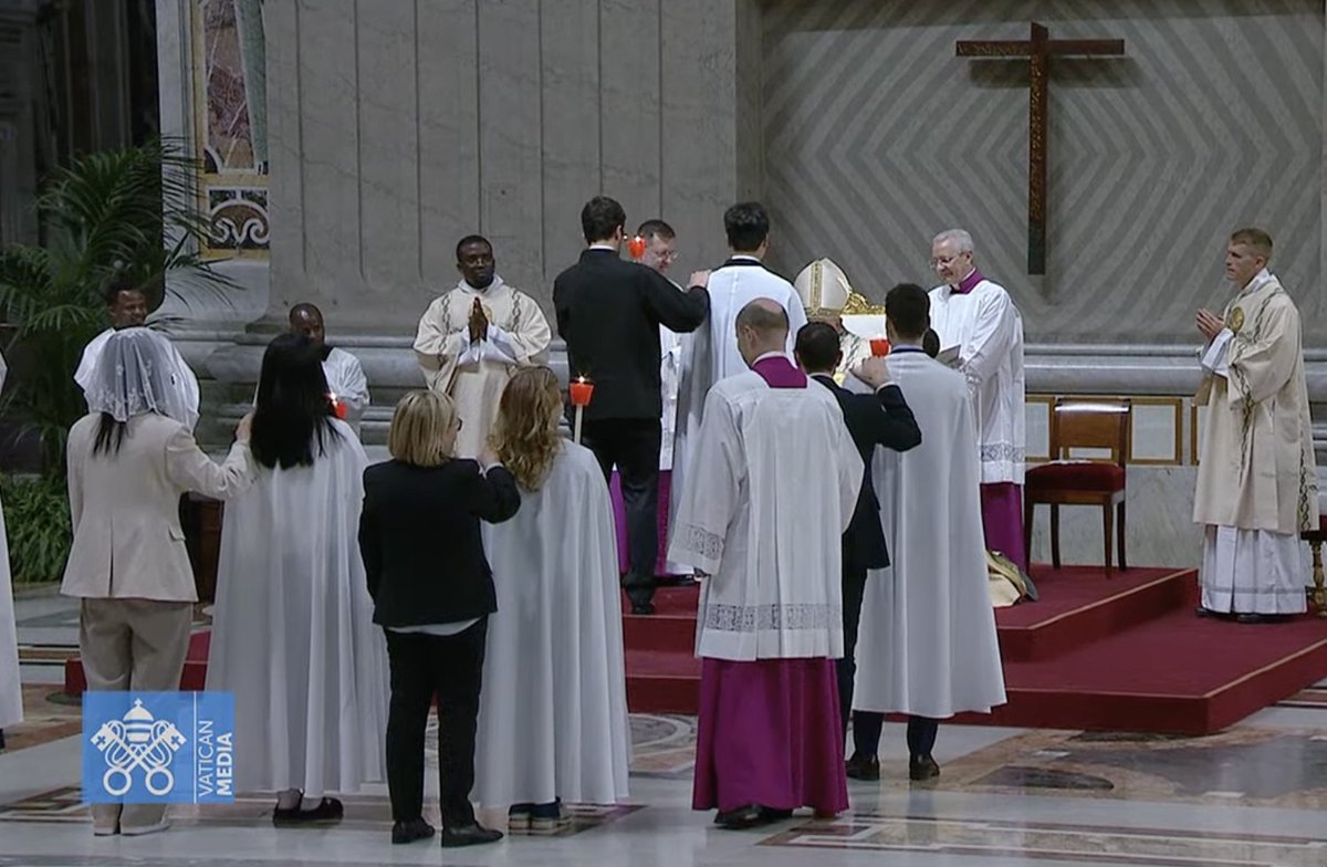 Now dressed in white, the newly baptized are confirmed by #PopeFrancis at the #EasterVigil.