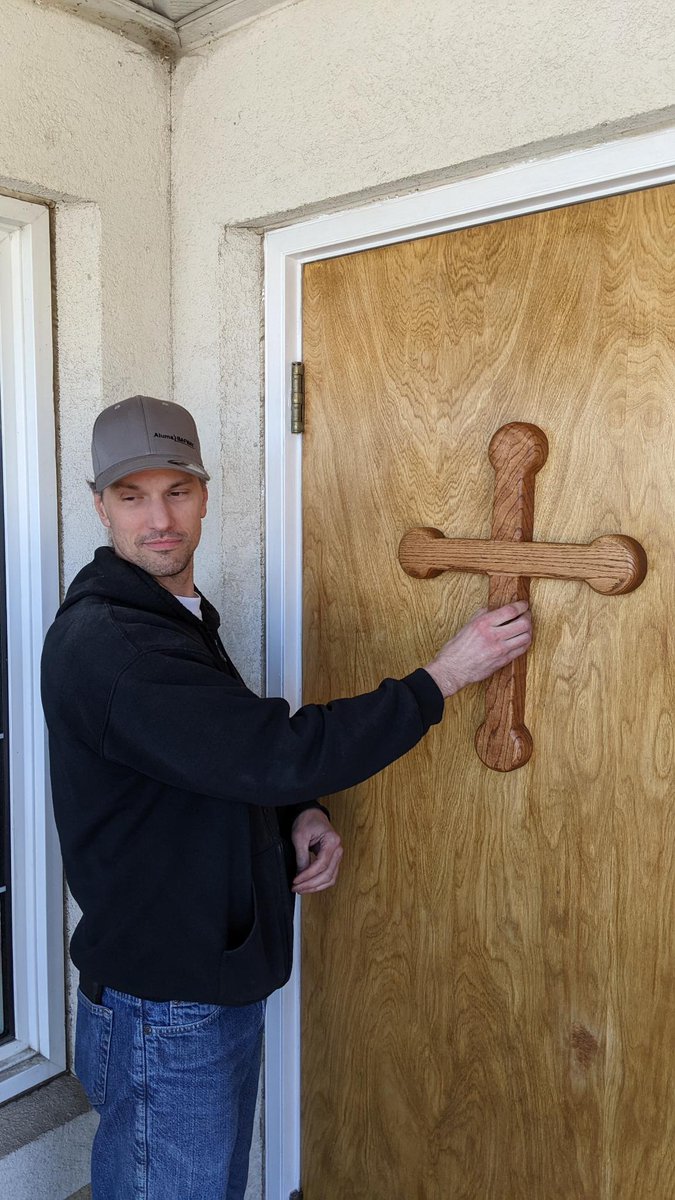 FrHysell's tweet photo. The first crosses are being installed on the doors of St Emeric Parish church, just in time for #Easter!
  The pommy cross is based upon the cross surmounting the Holy Crown of Hungary worn by the descendants of St Stephen, the Father of Christian #Hungary.
@archedmonton https://t.co/ImQK8Mpn5k