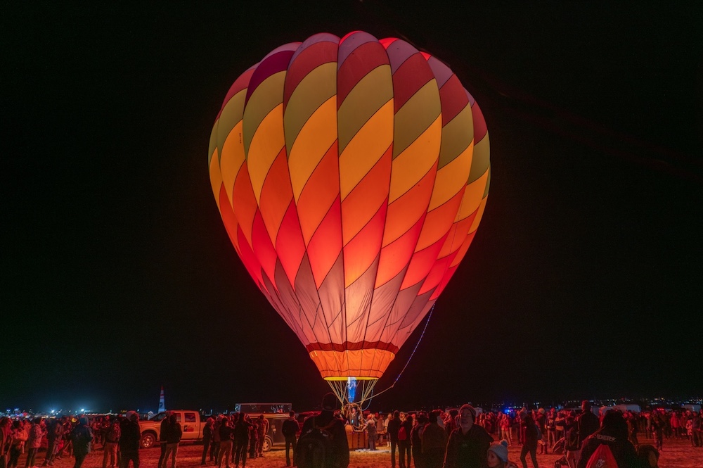 2023-12-12 Digital Image Competition judged by Rick Cloran, Photojournalism A winners:
1st - Six Feet from Others - Phillip Nardozzi
2nd - Another Day in Paradise - Martin Roy Moser
3rd - Crowds Gather for Predawn Launch - David Rider