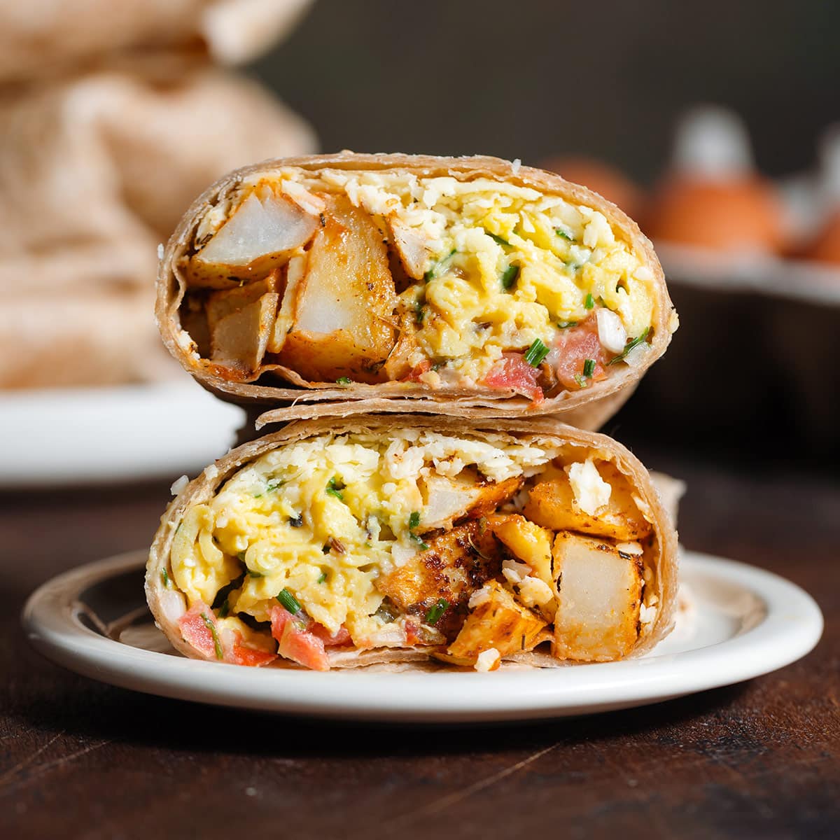 These Breakfast Burritos with Potatoes are easy to make and freezer-friendly so they're the perfect breakfast to make ahead, defrost, and reheat as needed! They're filling, satisfying, healthy, and vegetarian! #breakfastburritos thehealthfulideas.com/breakfast-burr…