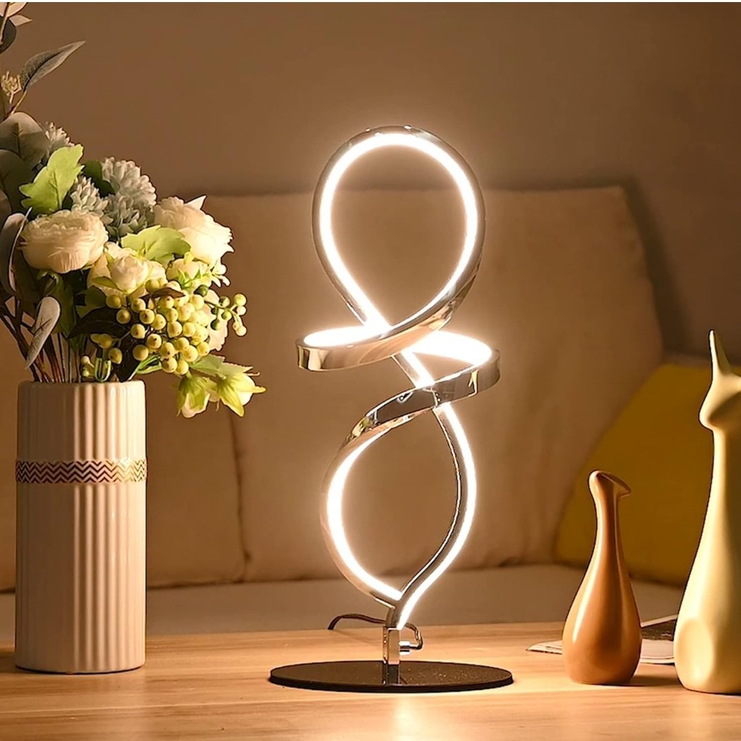 Illuminate your space with style and sophistication.  The sleek and modern MAYNA table lamp is the perfect addition to any room, providing versatile lighting options to create the ambiance you desire. #ModernLighting #ContemporaryDesign

👇

🛍 amzn.to/3voOhE5