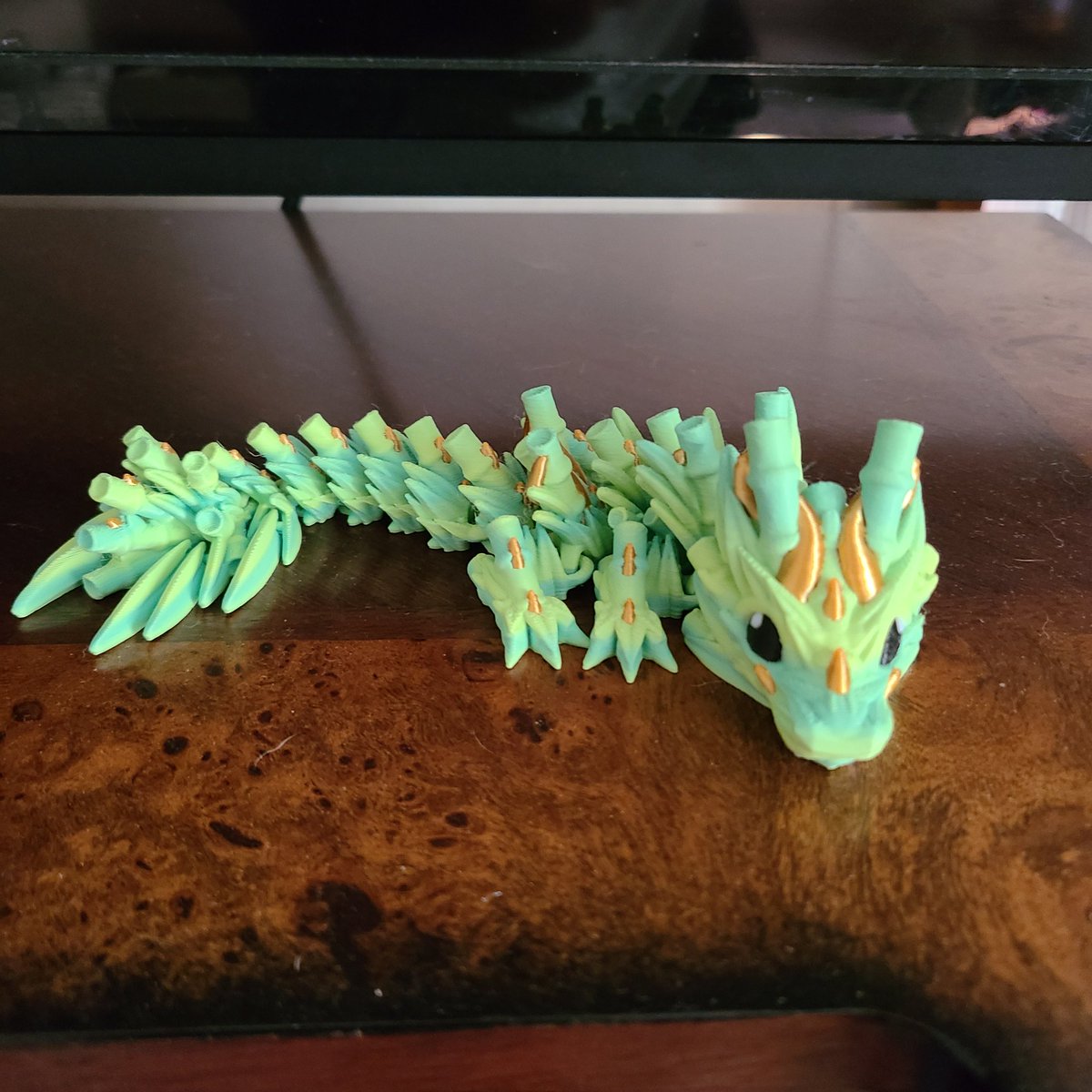 My newest adornment for my Christmas! He's a 3D printed Bamboo dragon!