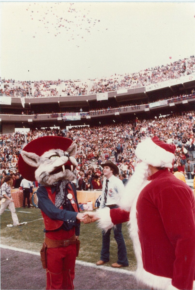 theseanlogan's tweet photo. @ClueHeywood but what about the time when wilbur met my dad at the 1979 fiesta bowl when he convinced security to let him onto the field because he showed up as santa https://t.co/FZXn8H8Dd6