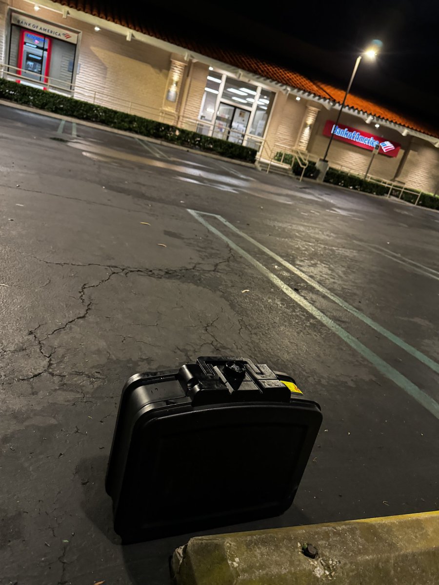 Just went to the ATM and there is a random black locked briefcase type thing just sitting in the parking lot... I've seen No Country For Old Men and ain't touching it! Called in to dispatch