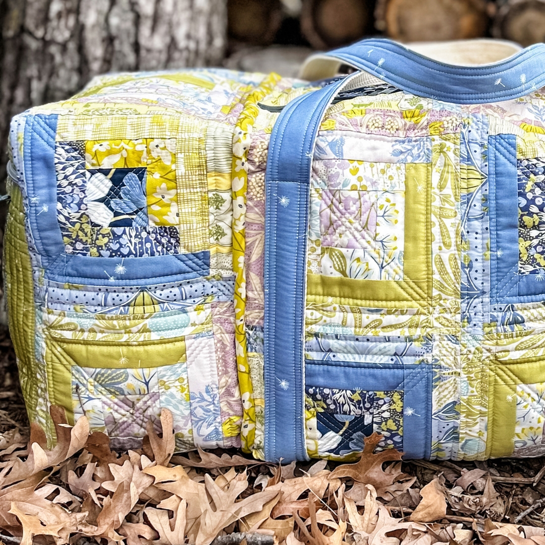 ArtGalleryFab's tweet photo. Travel in style with our quilted Road Trip Duffle Bag! 🚘🧳Crafted from #AGFFreshLinen, this spacious beauty is perfect for all your adventures. Get the FREE pattern in our lookbook: https://t.co/aNzijeODM9 #QuiltBlocks #Butterfly #EasyQuilting #QuiltingCommunity #DIYBag https://t.co/3lYRwFdjjV