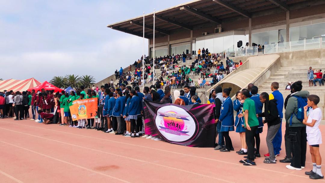 Empowering our future champions! Hon. Neville Andre inspires youth at the Erongo Regional Athletics Championship in Swakopmund.