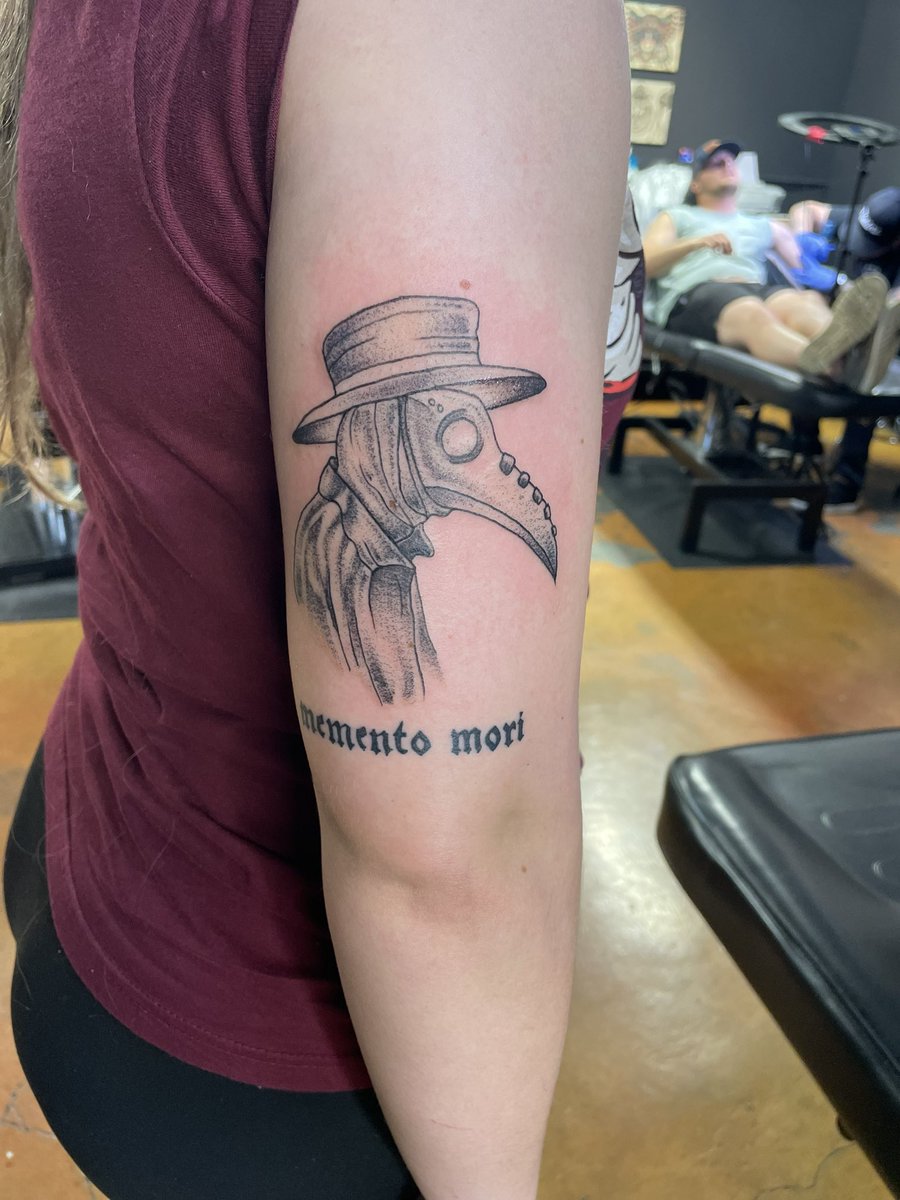 The middle's newest tattoo. On the other side she's got a skeleton  ouroboros and a line drawing of a crow skull. What's funny is she's not  goth or dark or anything, not, image size:900x1200