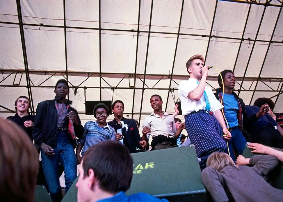 Remembering, like many, the great Terry Hall, born #OTD in 1959. Hugely missed & as the photos of Rock Against Racism/ANL Leeds carnival of #Specials show, someone who consistently fought racism & the National Front. Pics - Syd Shelton. @lmhrnational @SUTRLeeds @AntiRacismDay