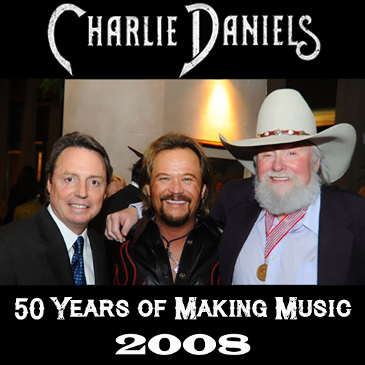 ON THIS DAY in 2008, @BMI threw a reception for Charlie to celebrate his 50 years of making music. Pictured with Charlie, BMI's Jody Williams & @Travistritt, CD was also presented with a plaque celebrating 500,000 units sold of CDs & DVDs from his Blue Hat Records label.~TeamCDB