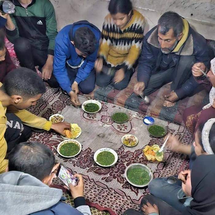 A Palestinian family in Gaza eats lemon soup and grass to break their fast. 💔