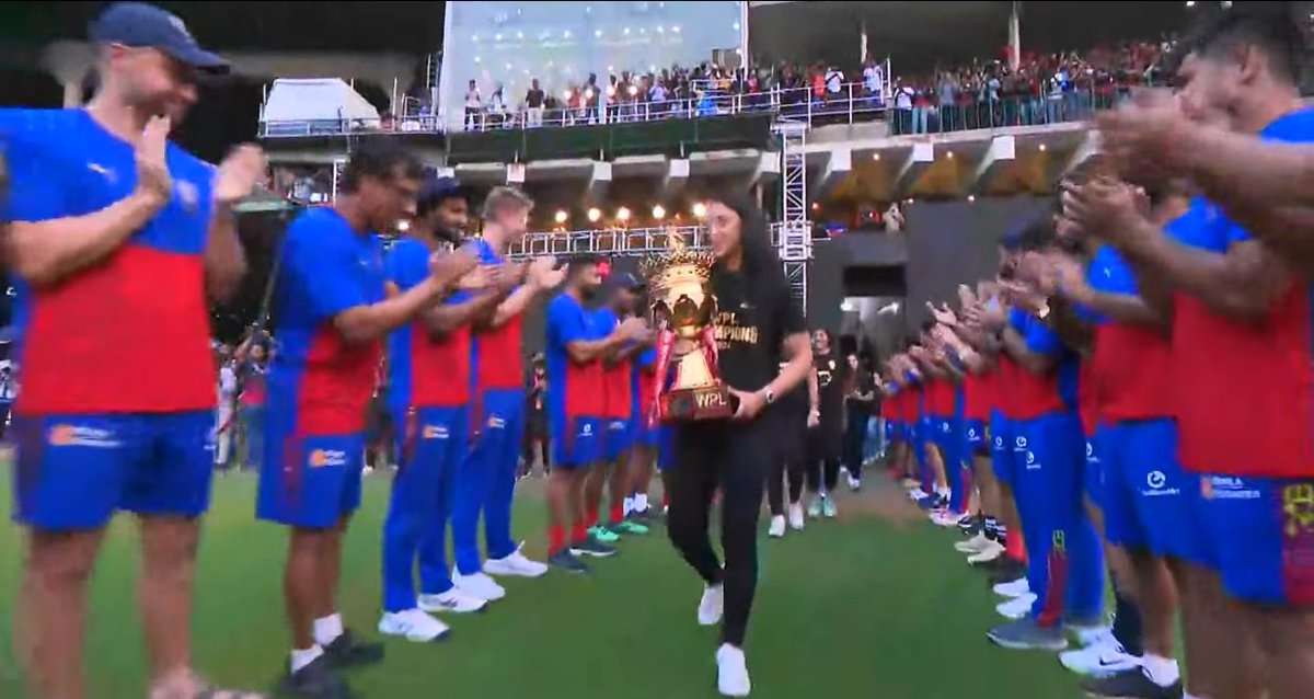 RCB Men's team giving guard of honour to RCB Women's team for winning the WPL.

- What a great gesture 👌