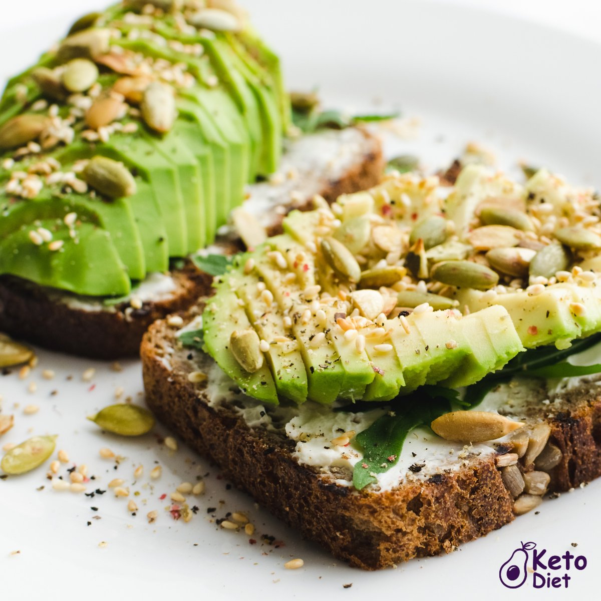 Low-carb toast with cream cheese and avocado topped with seeds 😋😍