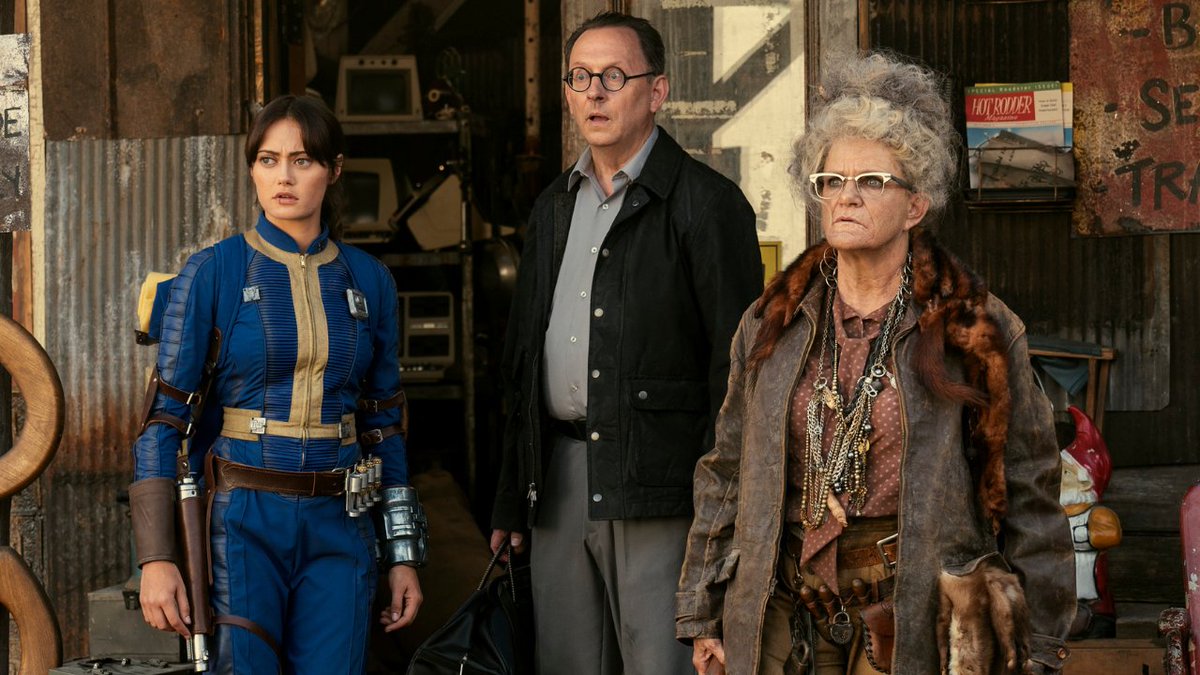IGN's tweet photo. Ella Purnell's Lucy (formerly known as the Vault Dweller) seems to be at odds with Walton Goggins' The Ghoul in this exclusive scene from Prime Video's upcoming Fallout series. https://t.co/GuqqSxmdj7 https://t.co/ZAQ8Q87gjk