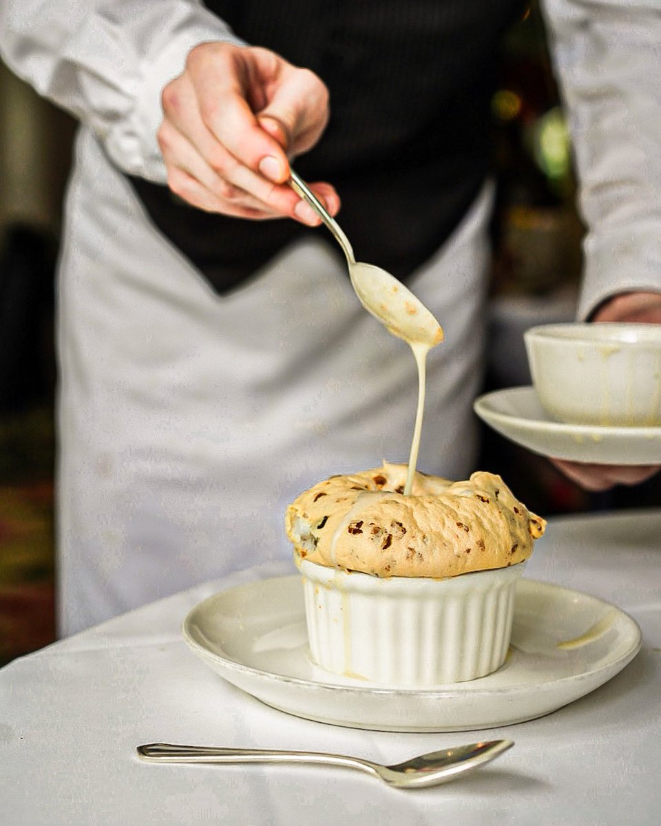 Missing New Orleans (and the iconic @Commanders_NOLA today). Say hello to one of the best desserts I’ve ever had: Creole Bread Pudding Soufflé (adequately dubbed “The Queen of Creole Desserts”). 😋🎭✨. #EatDrinkTravelYall #CommandersPalace