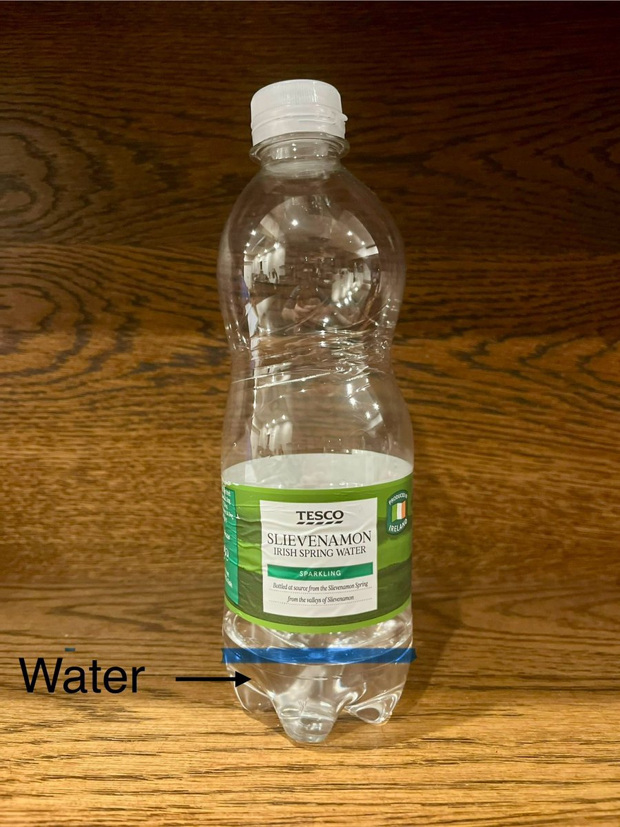 robertsweeney's tweet photo. Dear @TescoIrl, it looks like this partially filled bottle snuck past quality control 😁. https://t.co/URe6hdnsEx