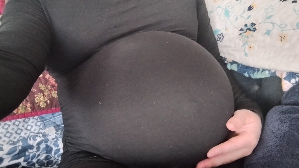 I like to relax on the sofa and watch the baby move and kick. She loves it when I rub my belly. 🤰👣☺️ #pregnant #pregnancy #pregnantbelly #babybump #itsagirl #pregnantmom #pregnantmommy